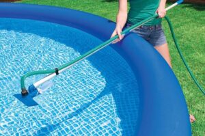 how do you vacuum an above ground pool
